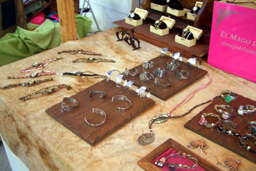 A stall selling handcrafted items at a fiesta in Porto do Son