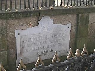 The plaque on Moore's tomb